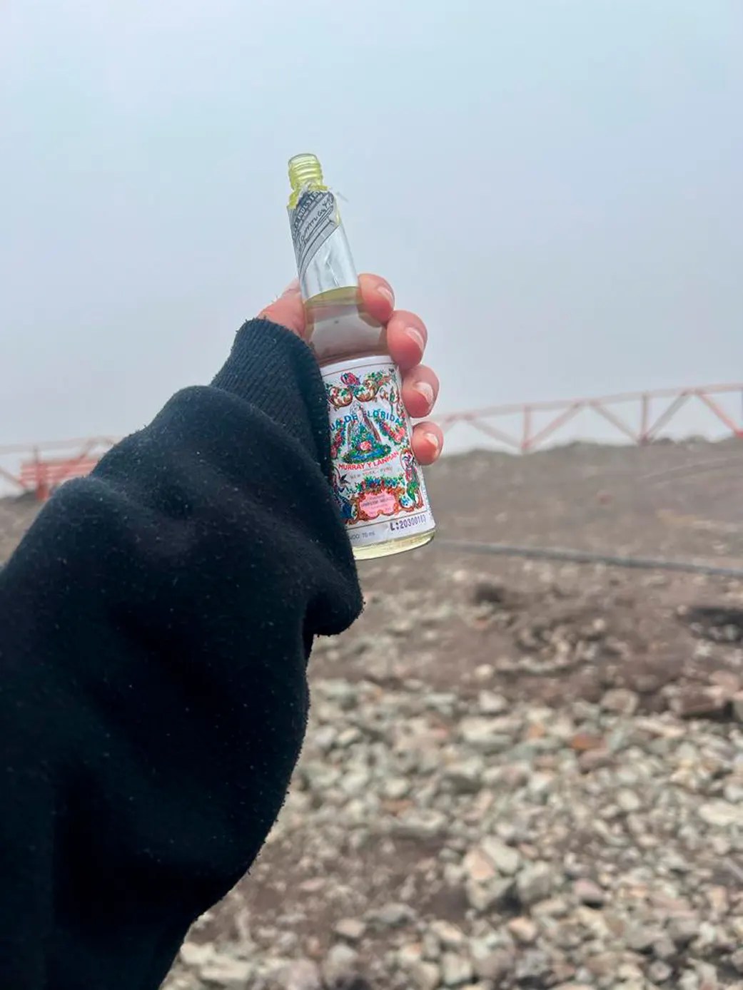 Hand with bottle of Aqua de Florida